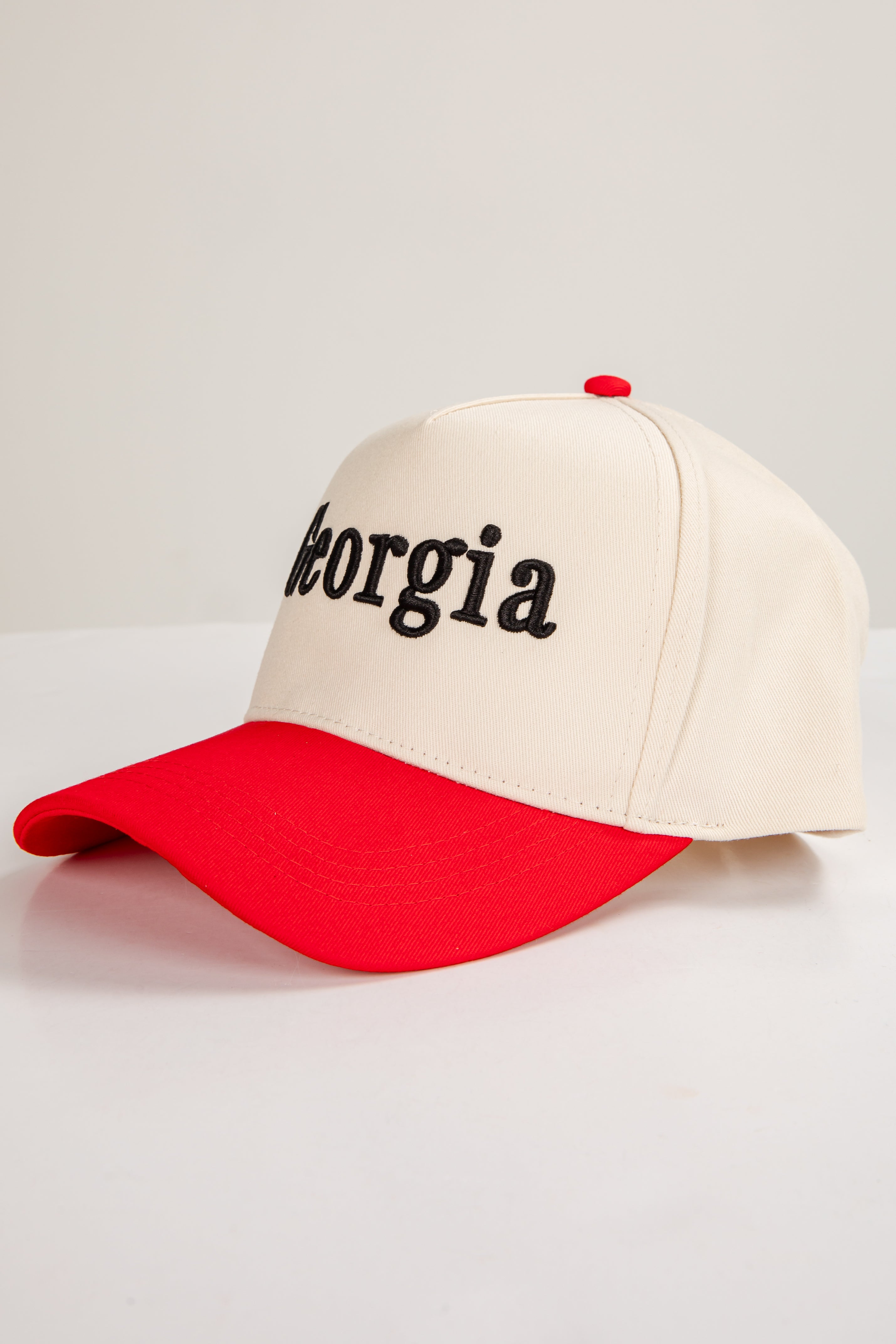 Cap with &