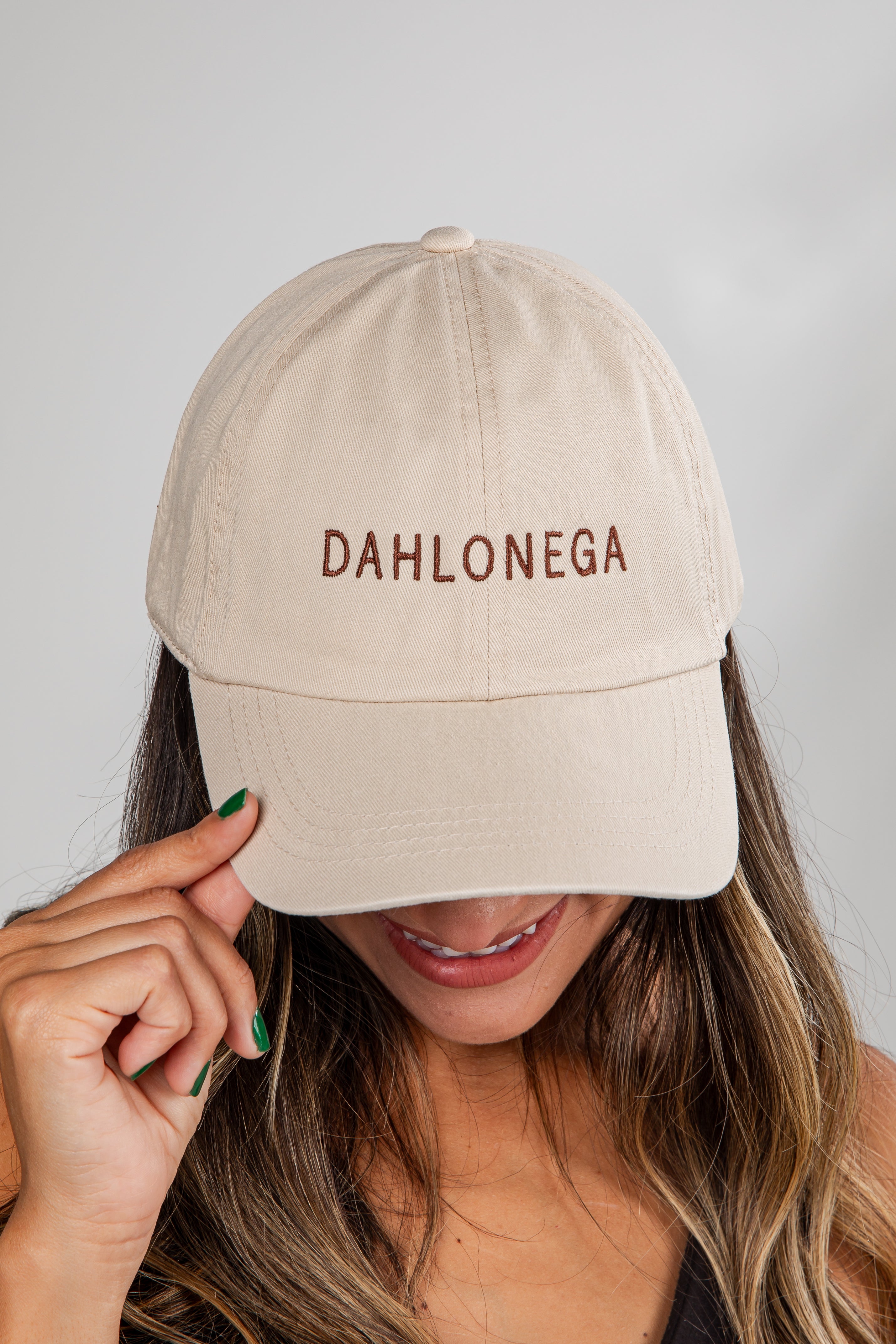 Beige cap with &