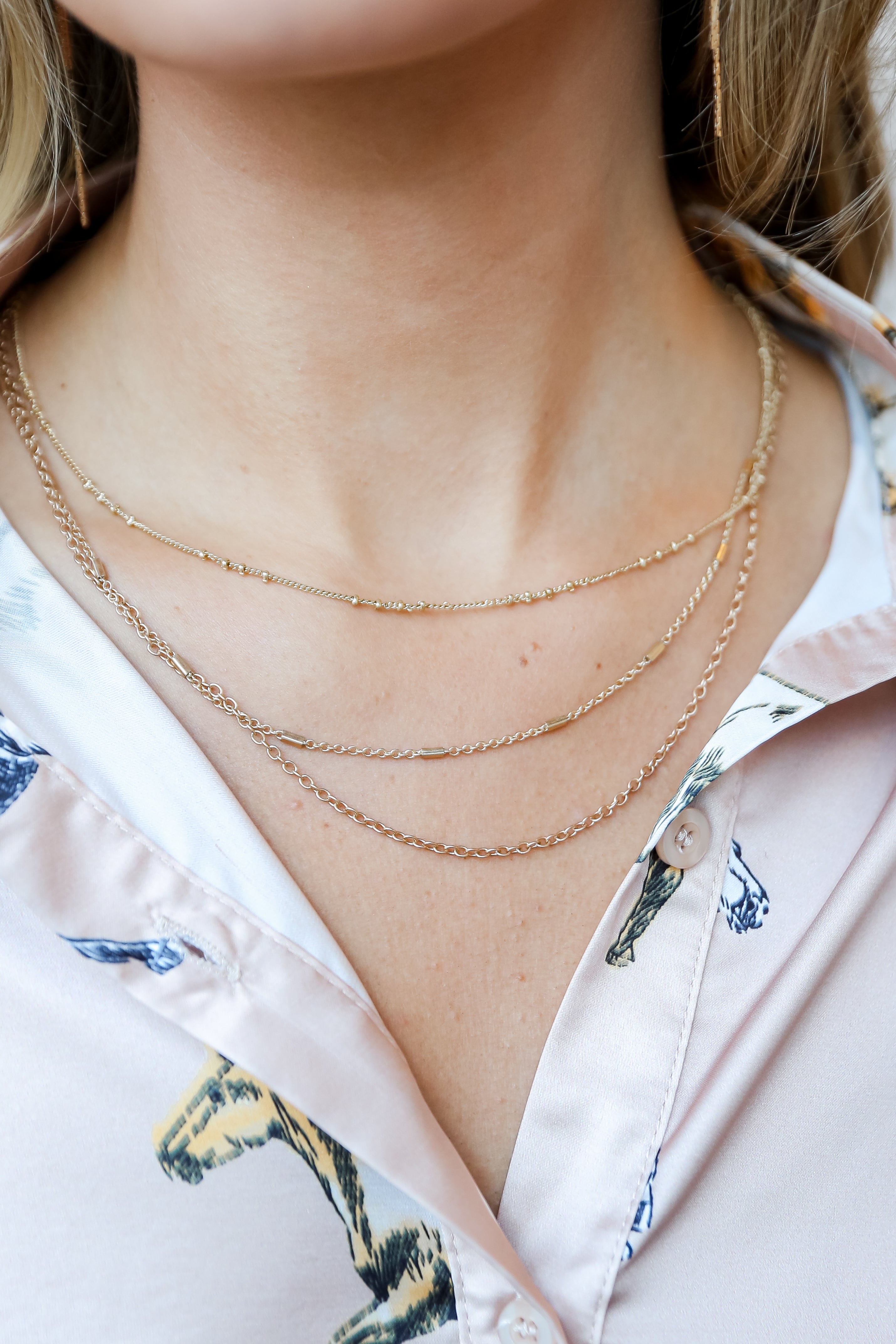 Gold Layered Chain Necklace on model