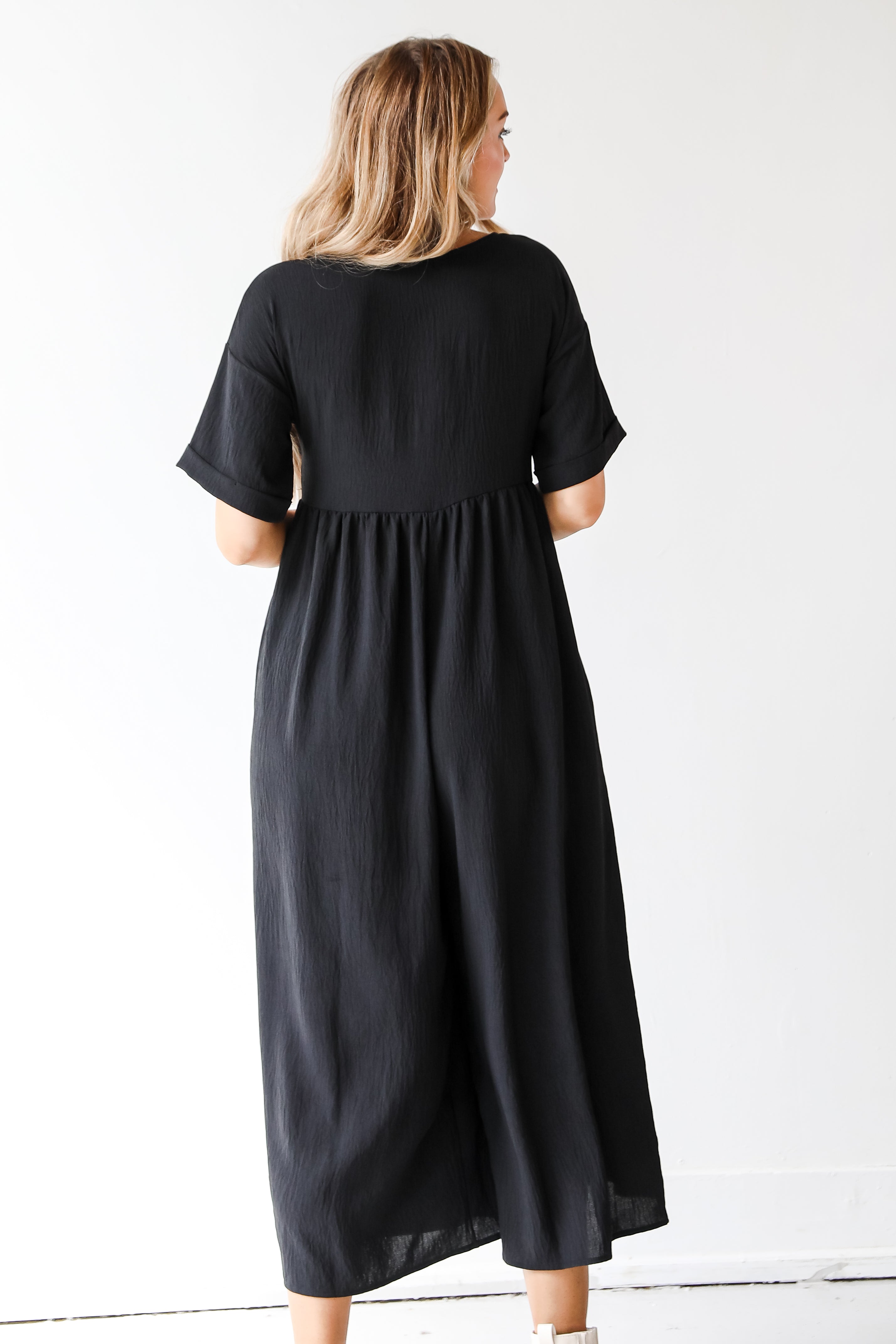 black jumpsuit back view
