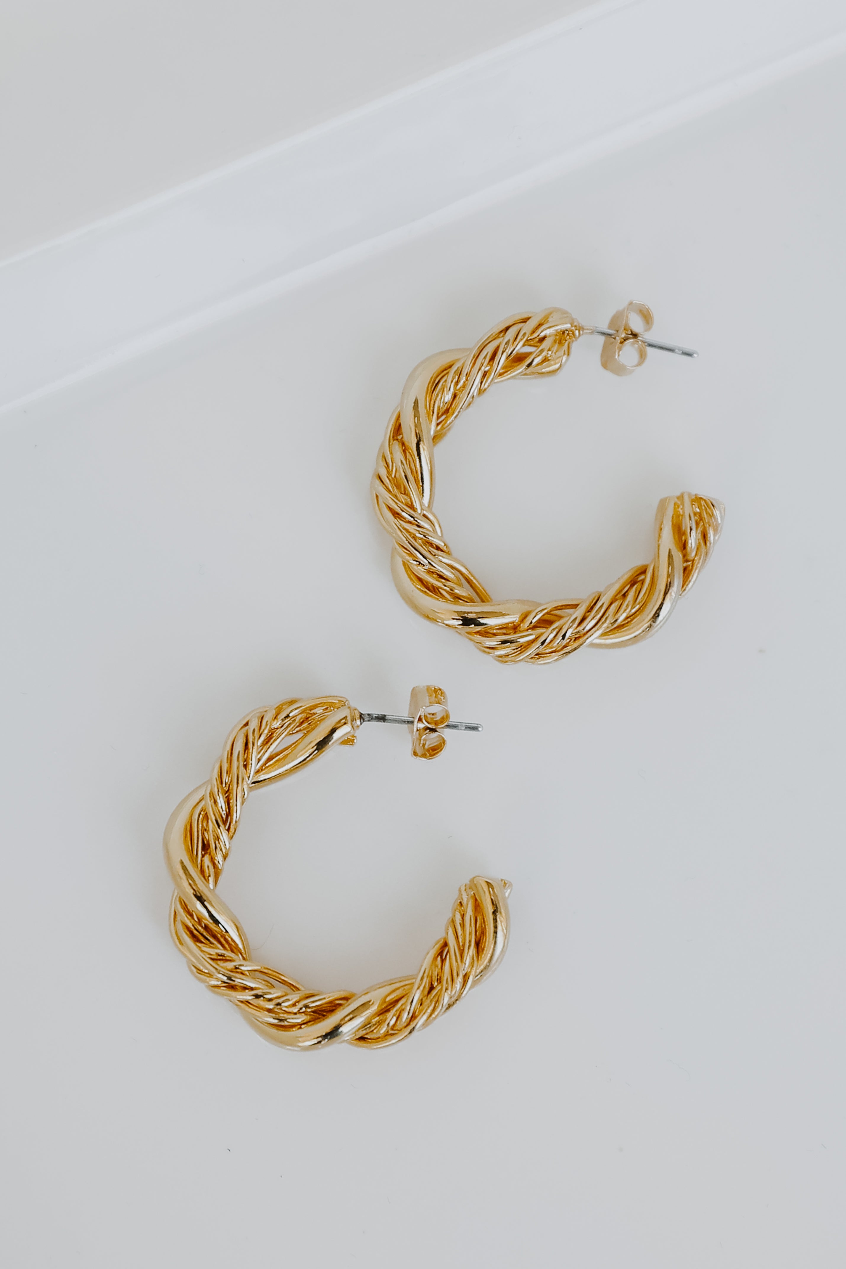Gold Twisted Hoop Earrings from dress up