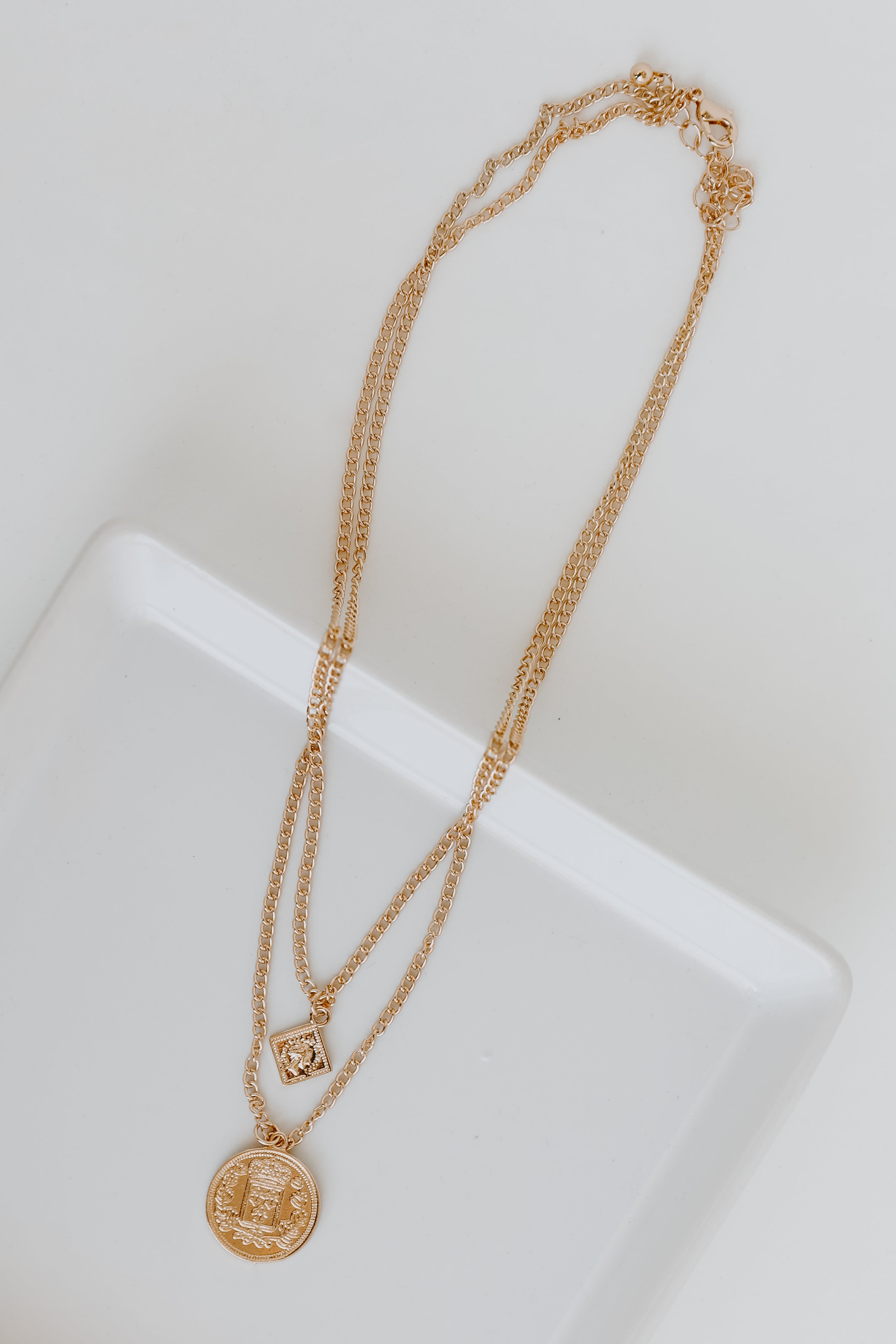 Gold Layered Coin Necklace flat lay