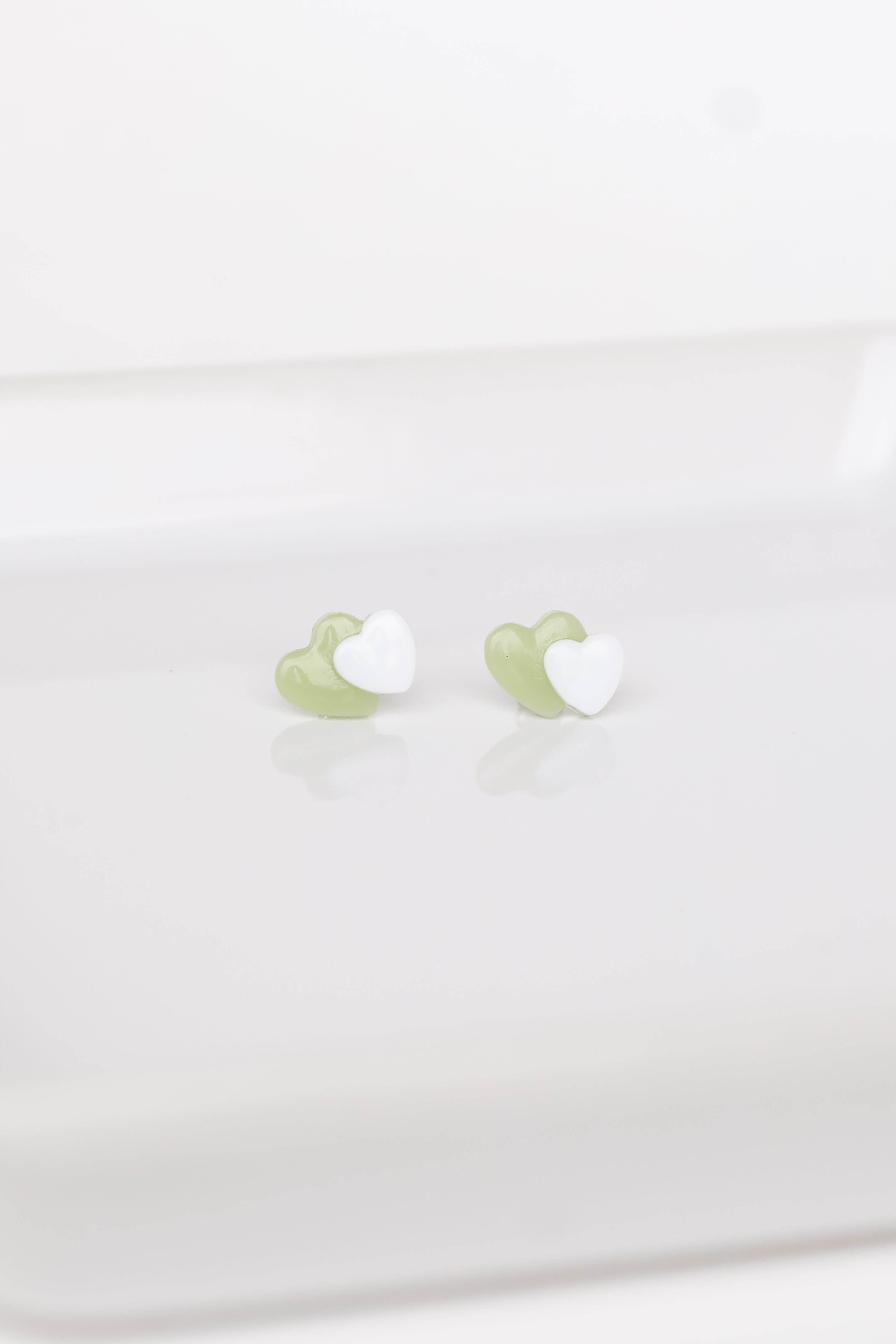 Heart Stud Earrings flat lay
