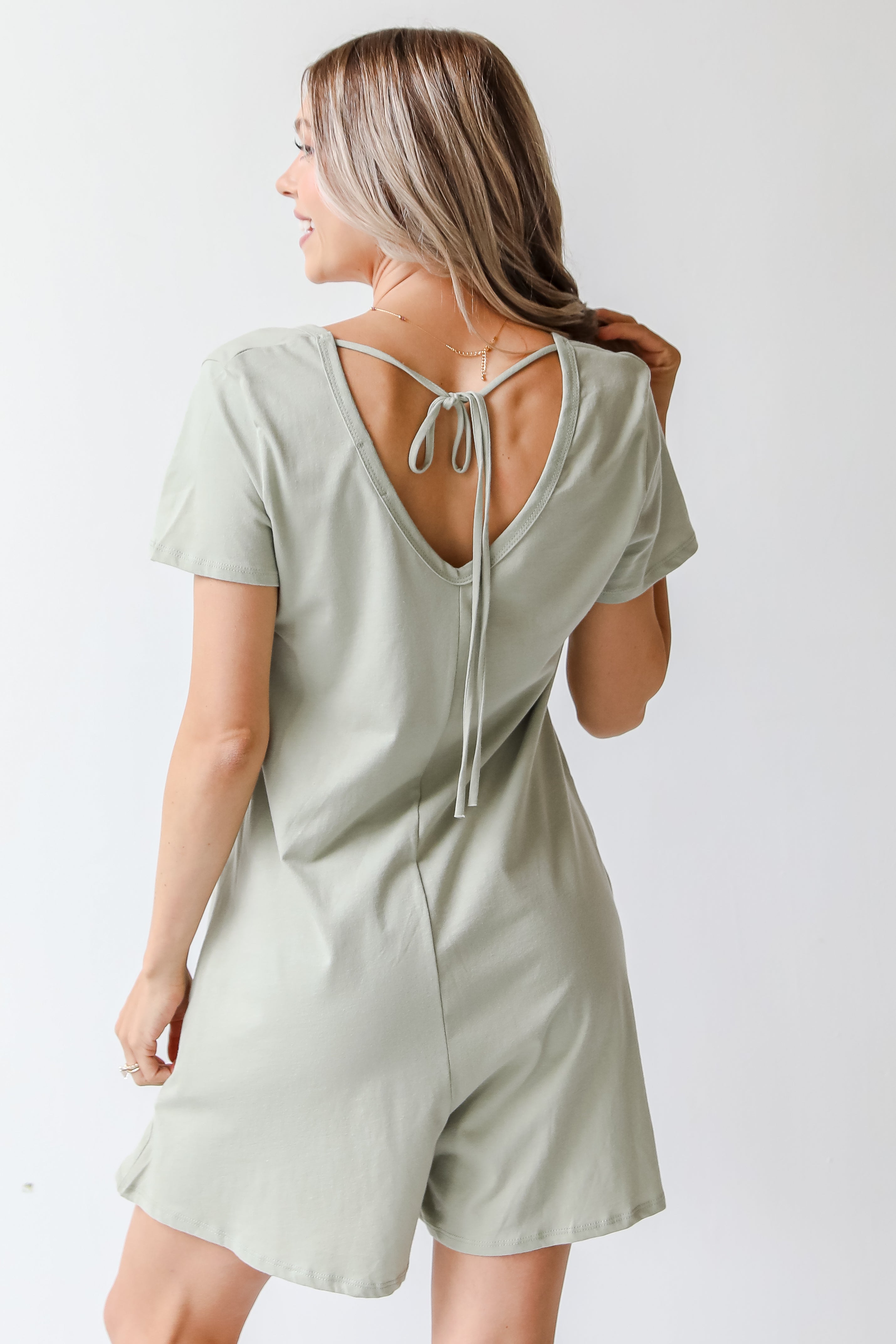 sage romper in the back