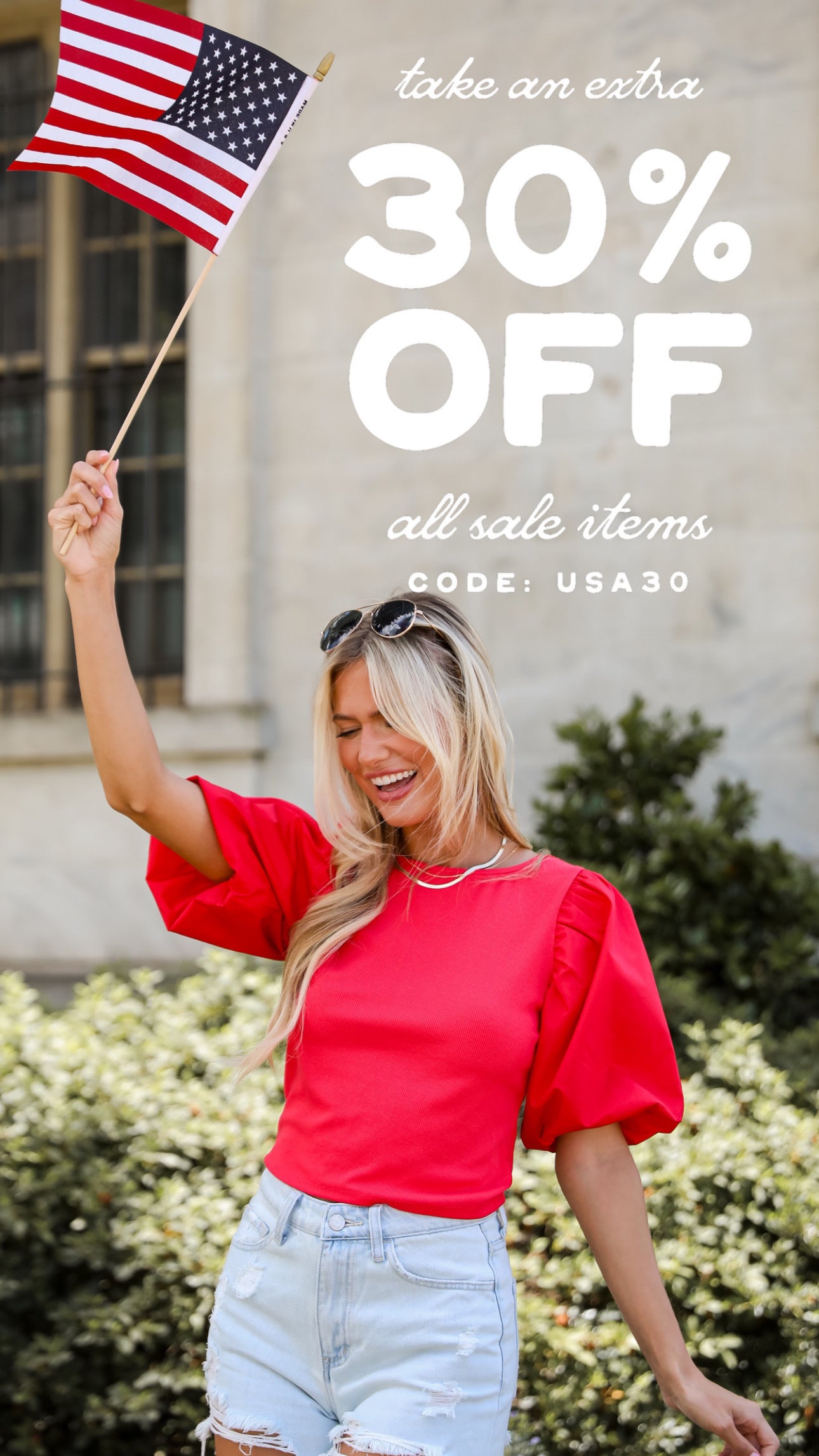 model promoting Harvey Boutique's extra 30% off sale items