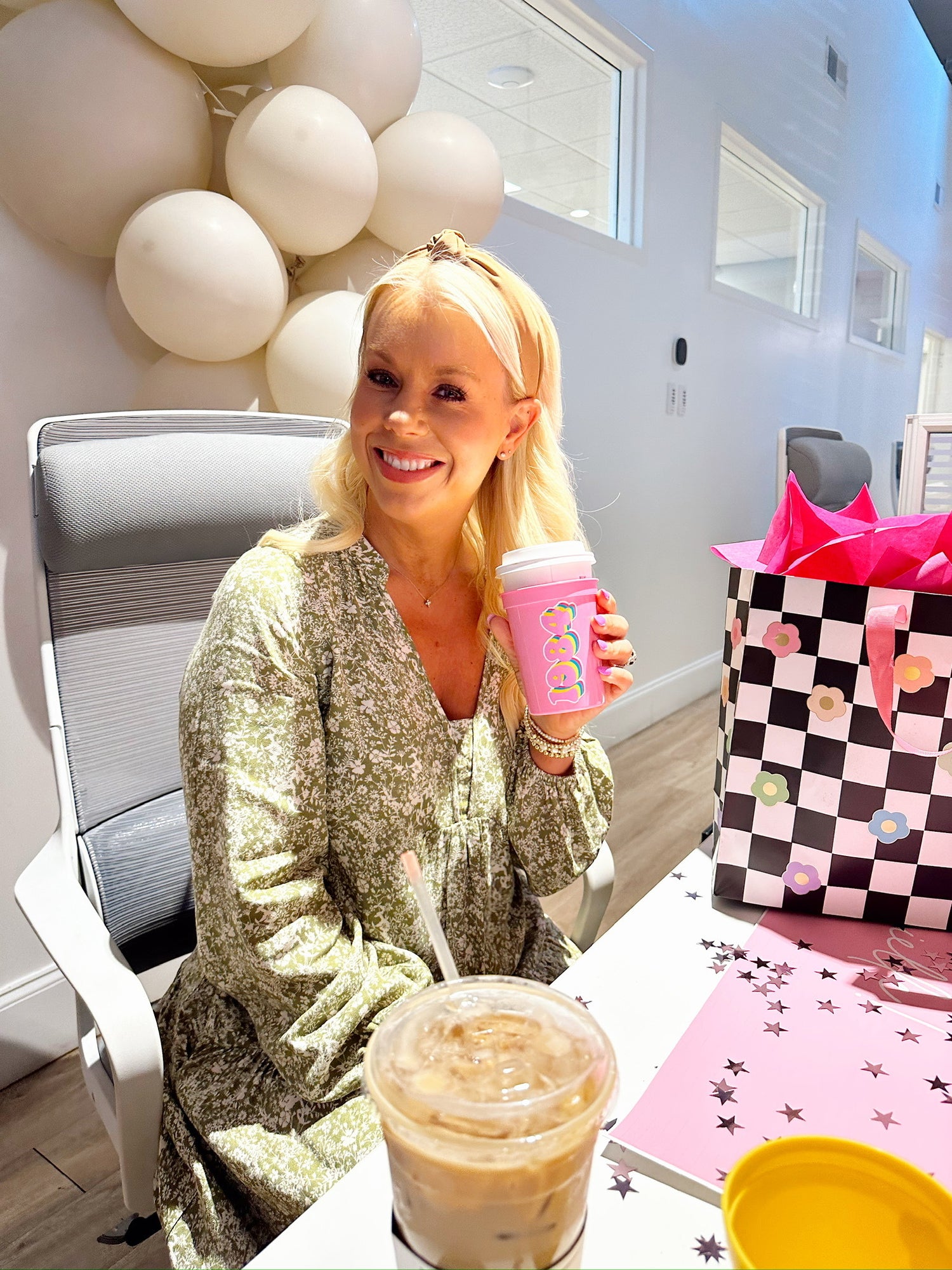 a girl celebrating her birthday with her Harvey Boutique family