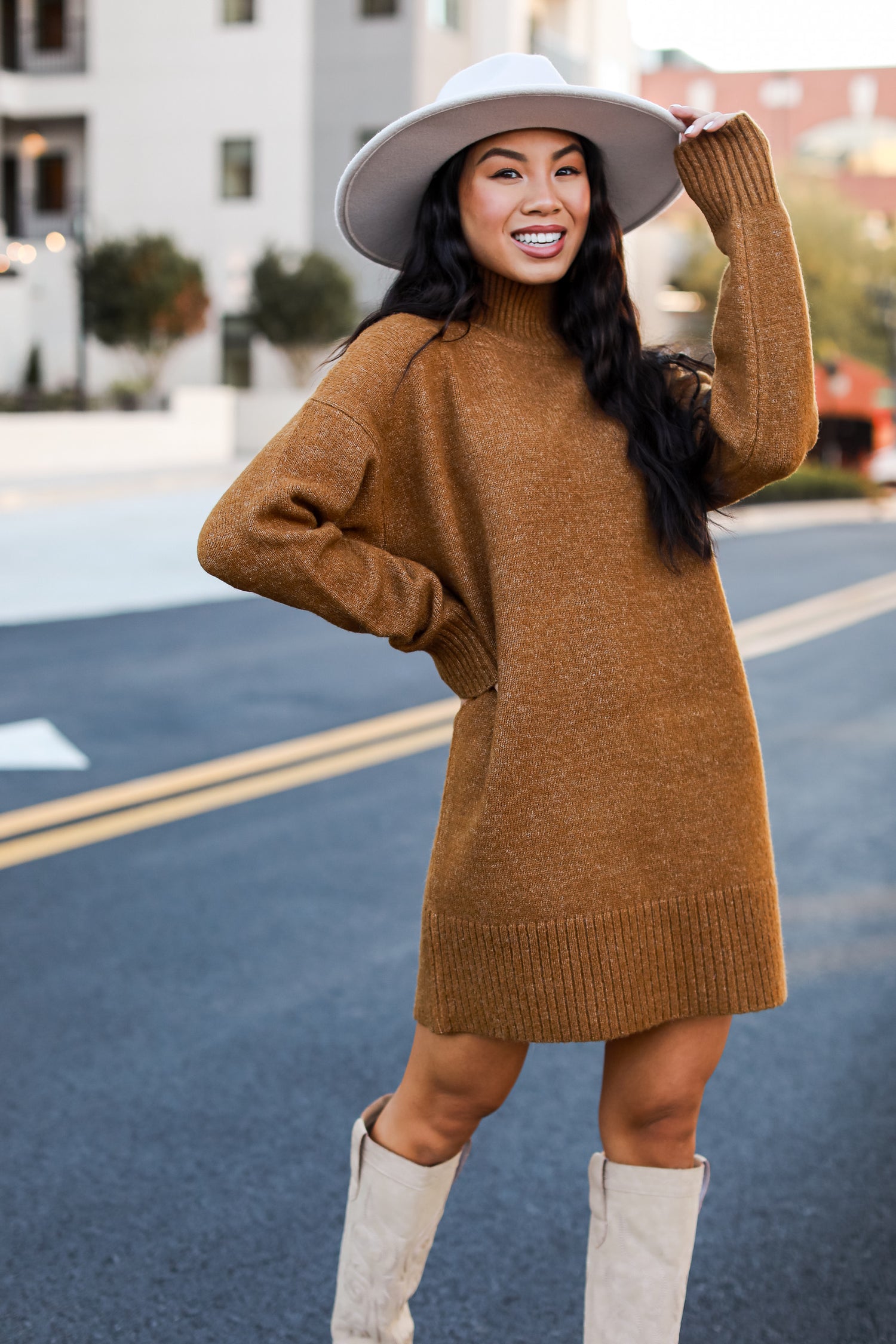 Model wearing brown sweater dress. Online dress boutique. Sweater dress for women. cute dresses.