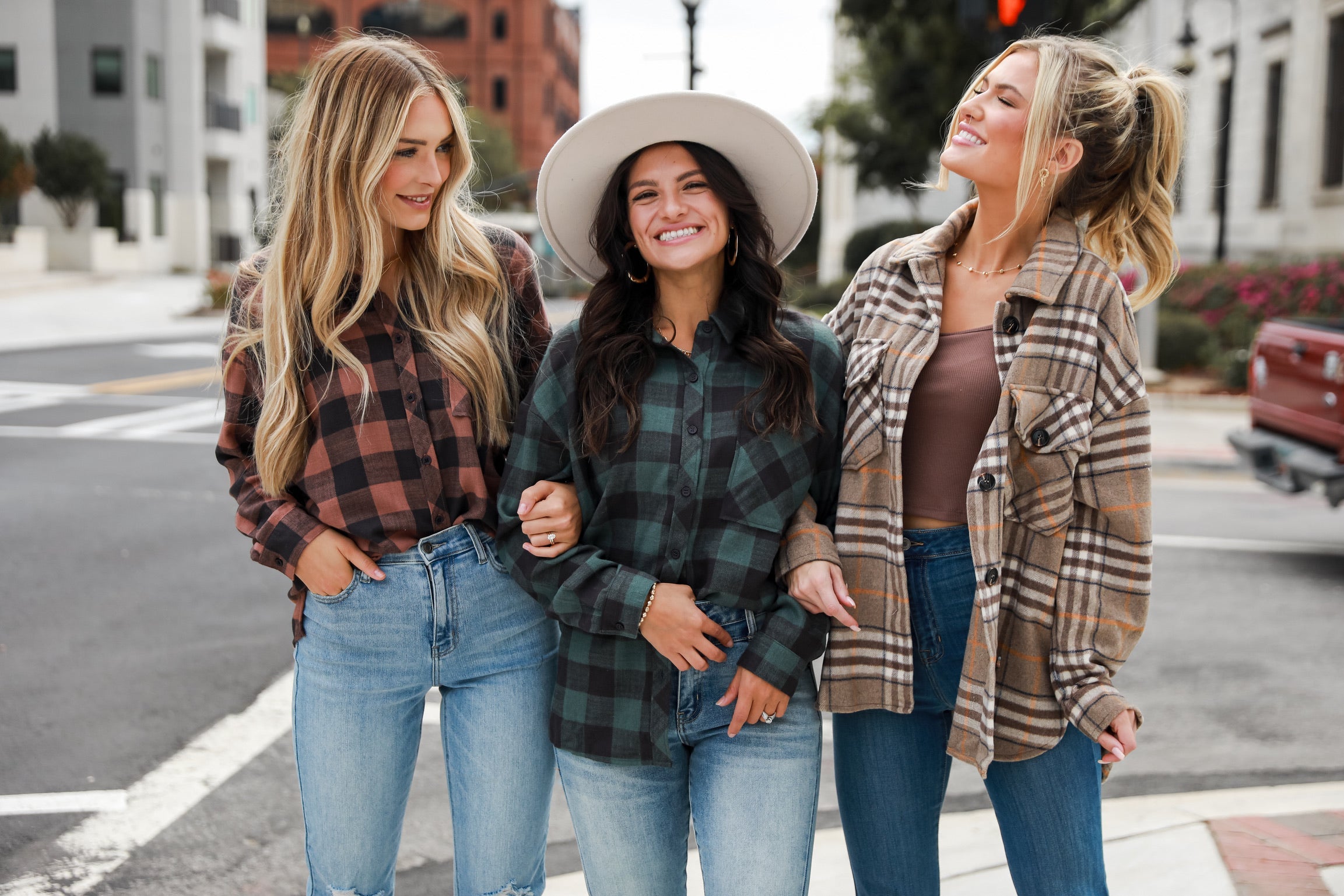 models wearing cute plaid tops for fall. Online boutique. fall flannel. plaid shacket