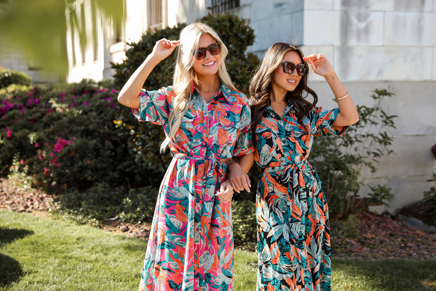 models wearing tropical dresses