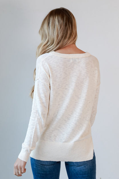 white knit top