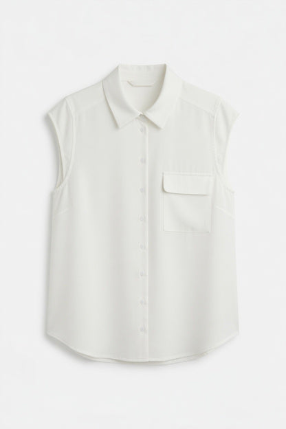 A sleeveless white button-up shirt with a pointed collar and a chest pocket, displayed on a clean white background.