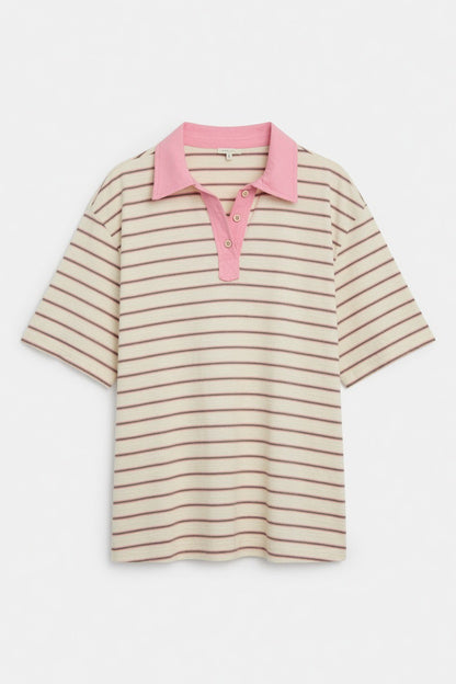 A short-sleeve polo shirt with thin horizontal beige and brown stripes, featuring a solid pink collar and matching pink button placket, displayed on a clean white background.