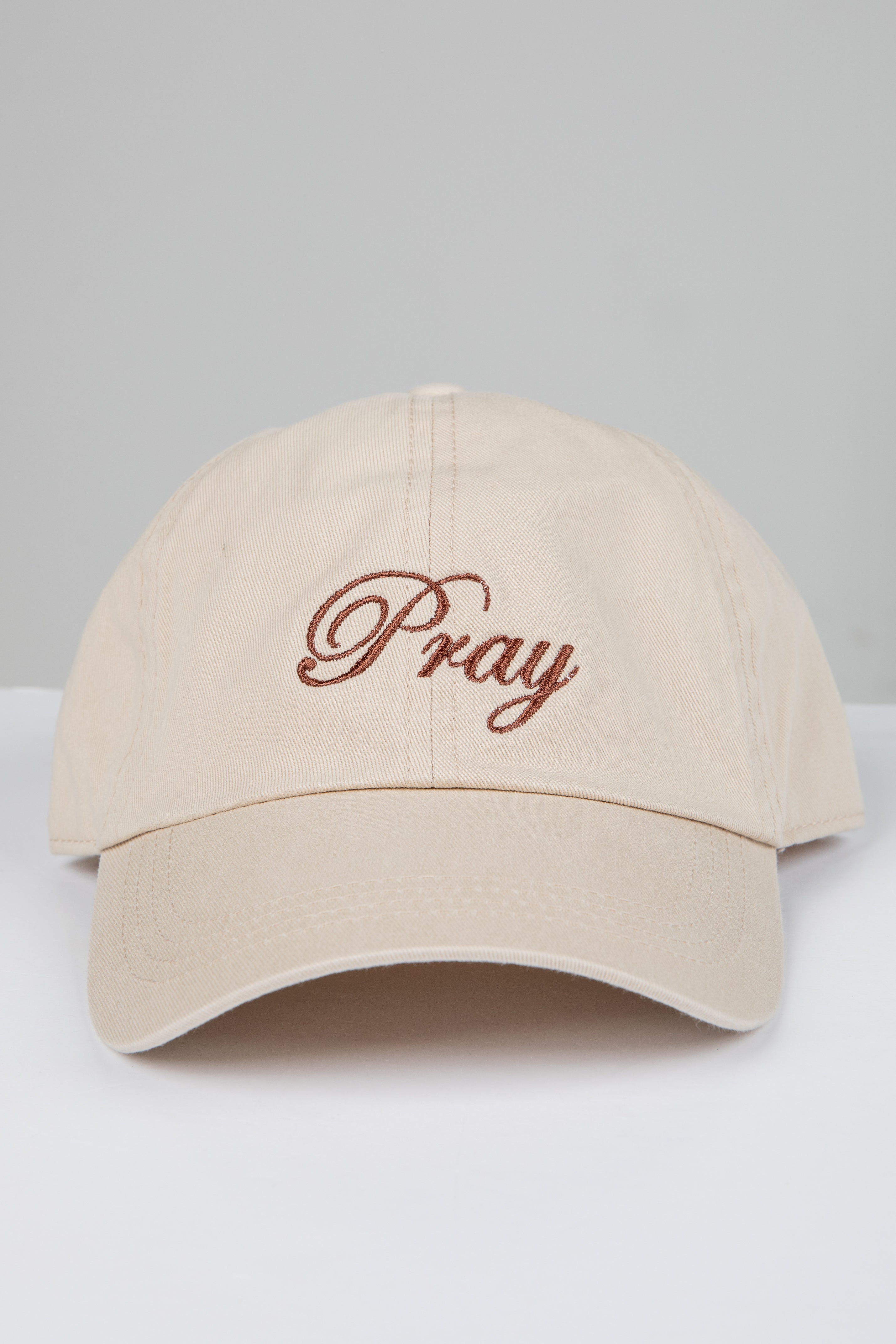 Beige cap with &