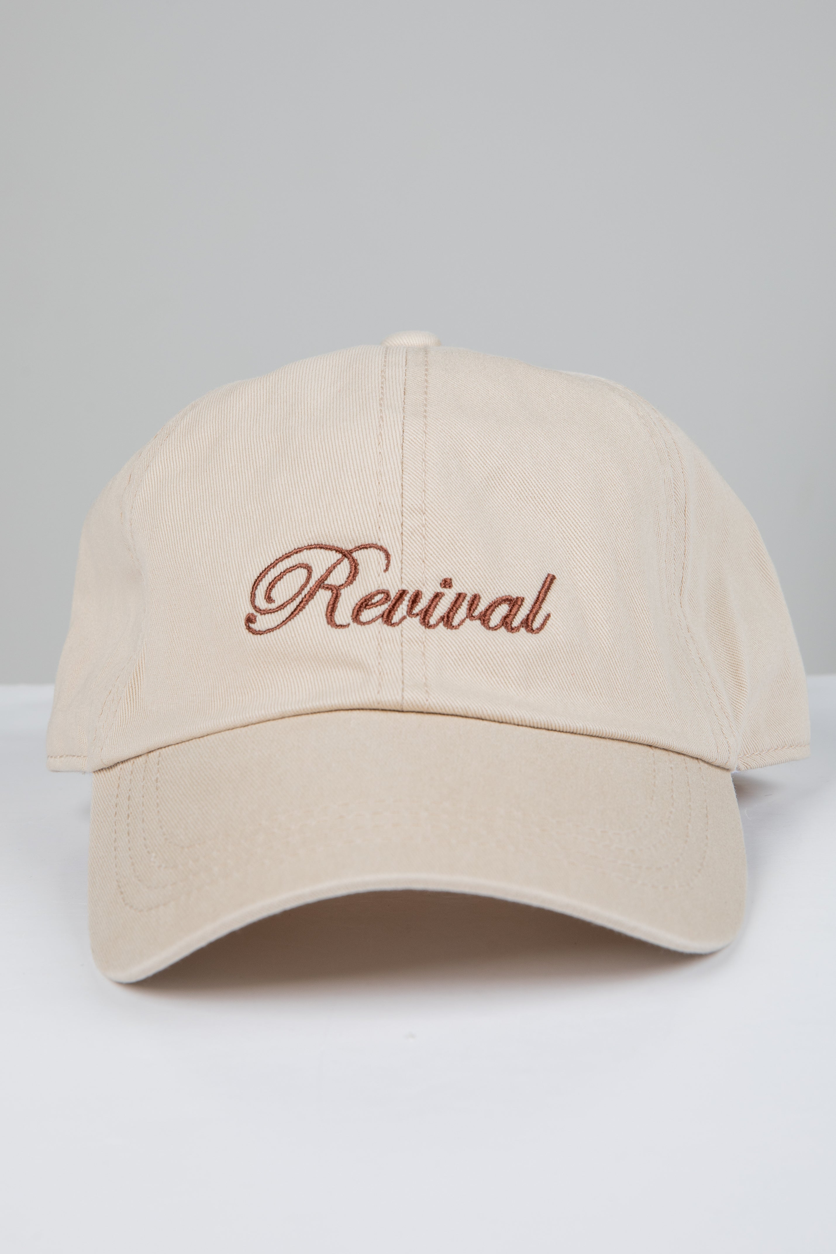 Beige cap with &