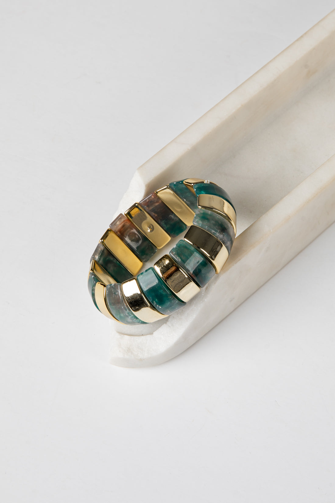 Picture of a green and gold women&