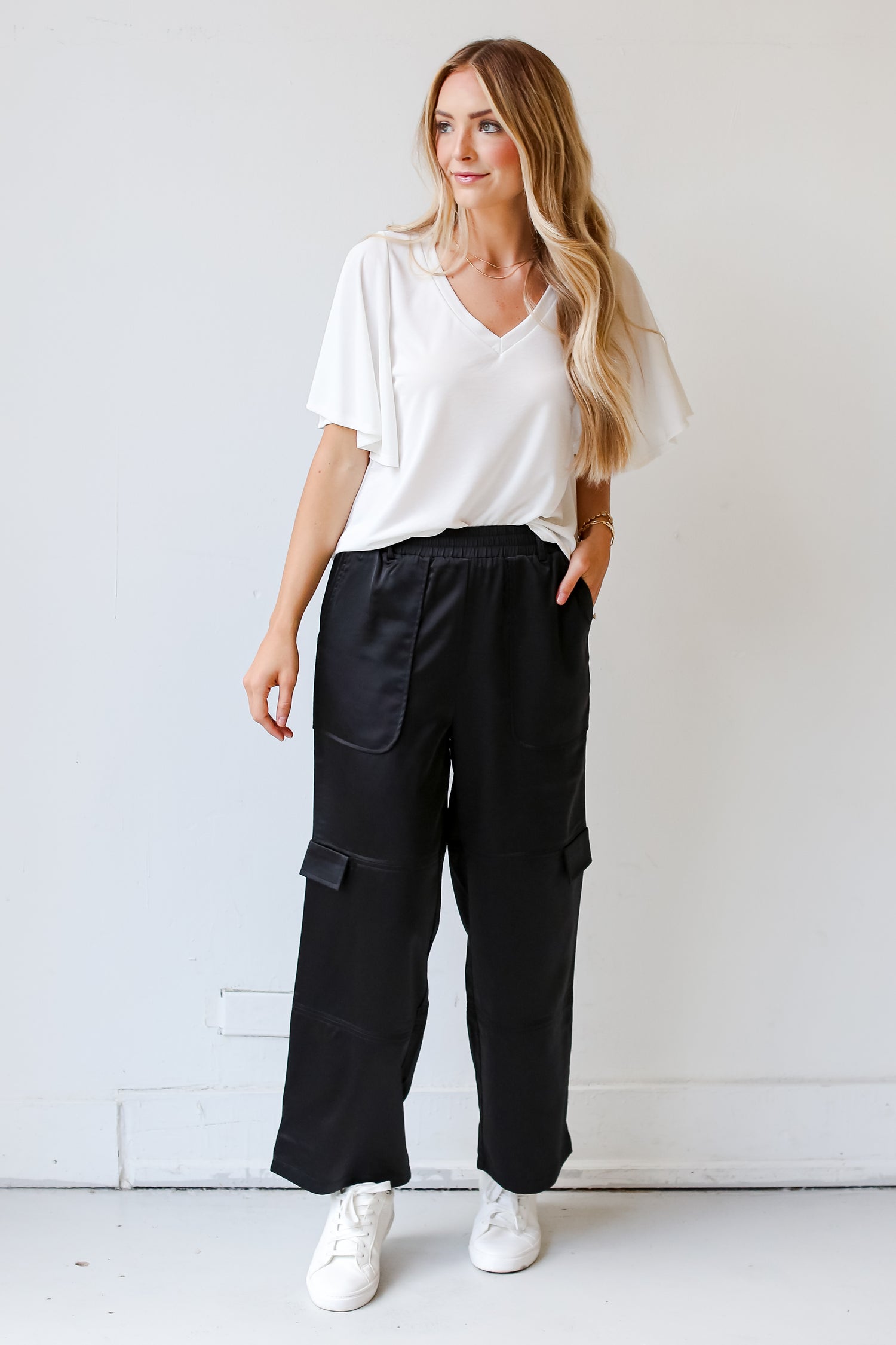 model wearing Black Satin Cargo Pants