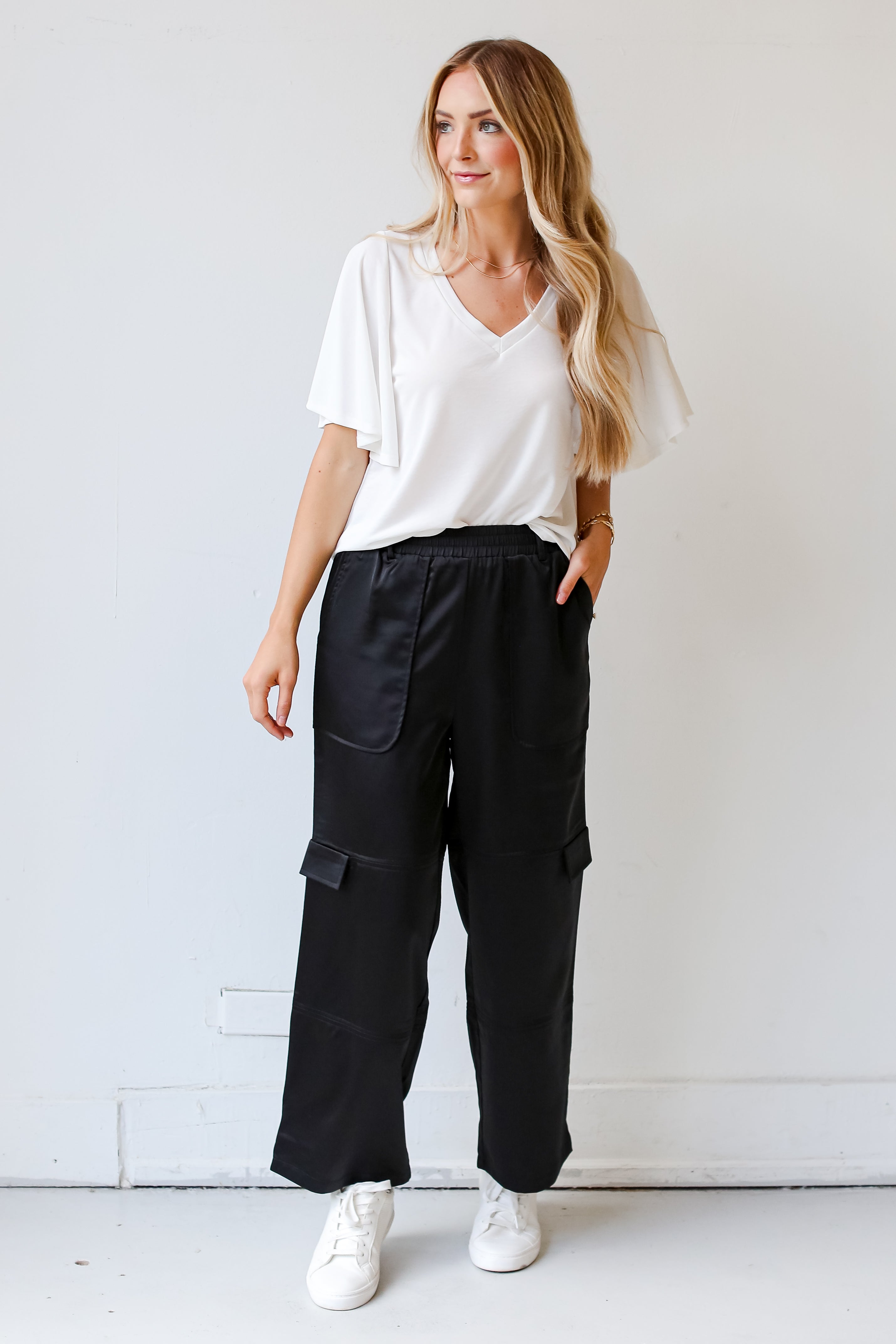 model wearing Black Satin Cargo Pants