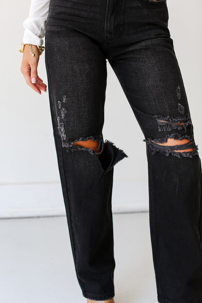 model wearing Black Distressed Dad Jeans