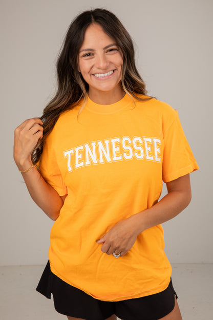 Woman wearing a yellow &