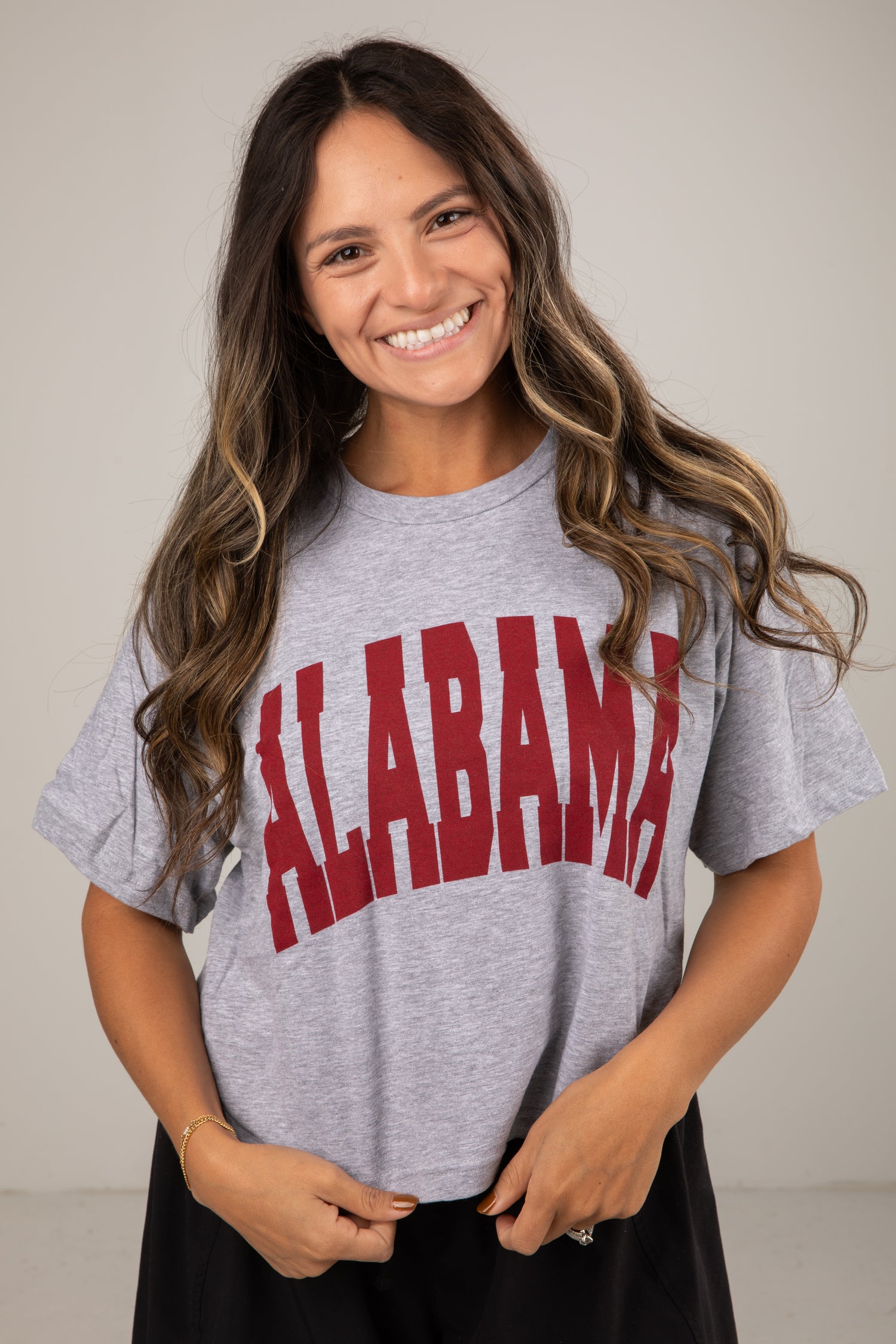 Woman wearing a gray &