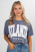 Woman wearing a blue t-shirt with &