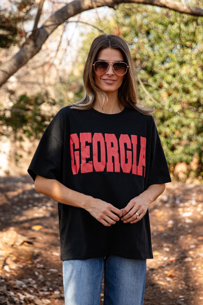 Woman wearing a black &