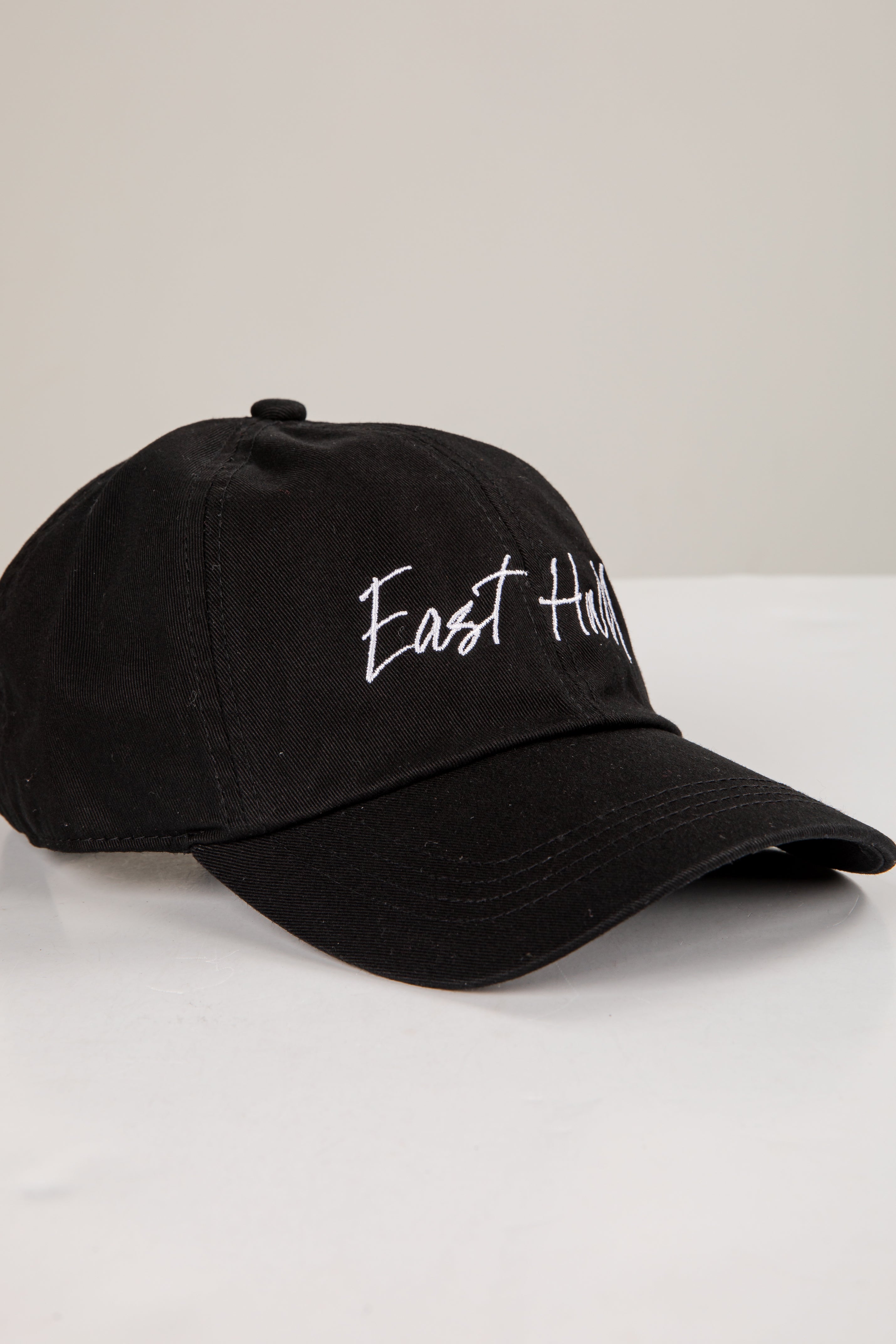 Black cap with &