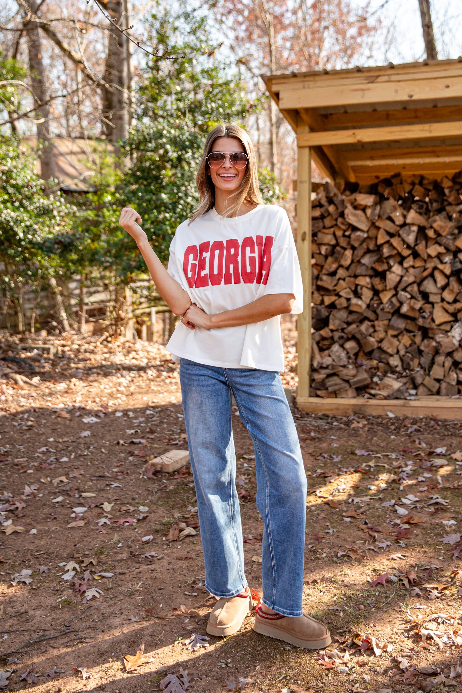 Woman wearing a white t-shirt with &