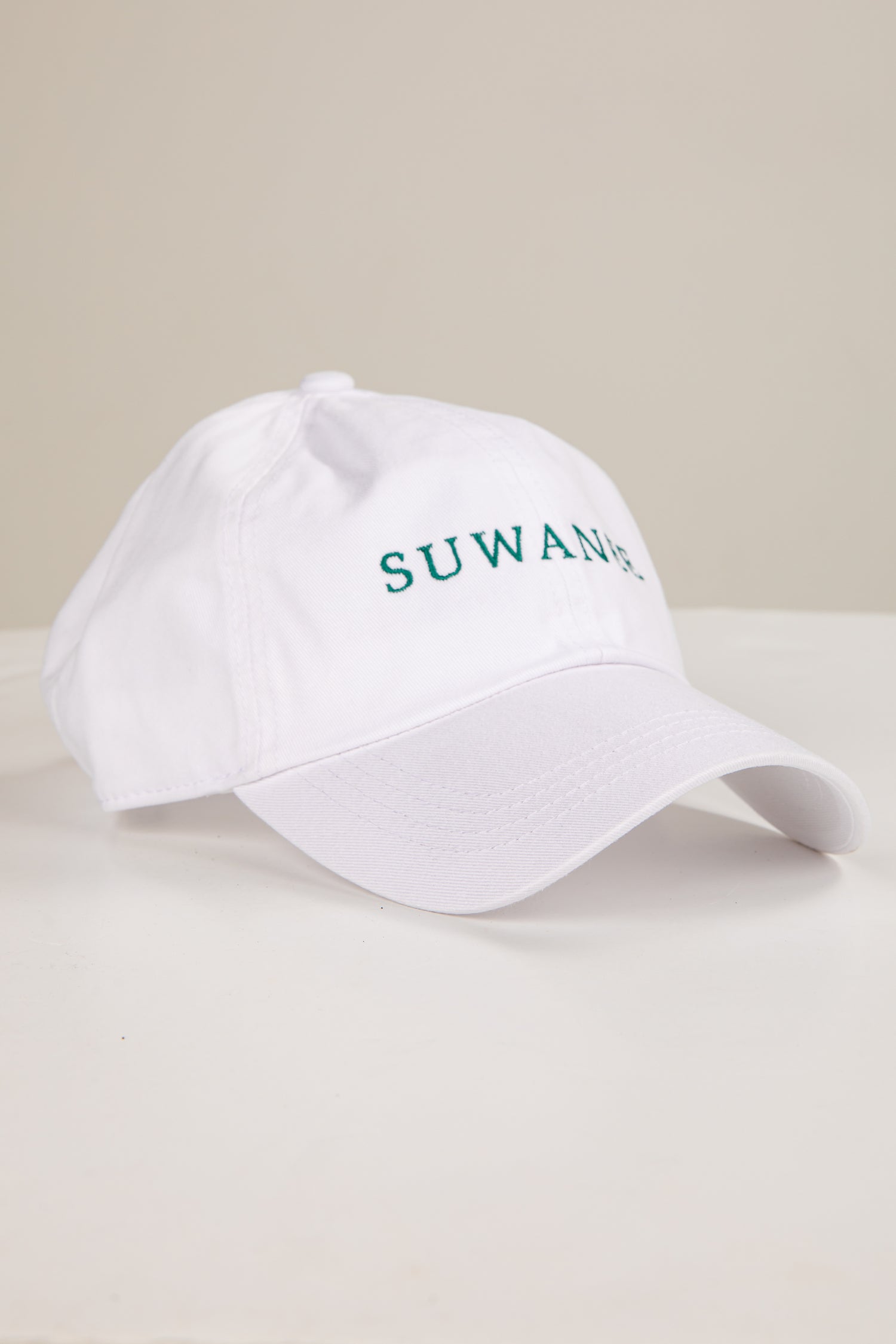 White cap with &