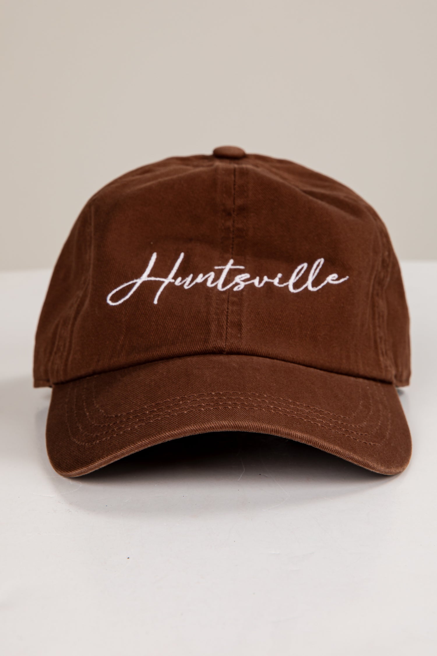 Brown cap with &