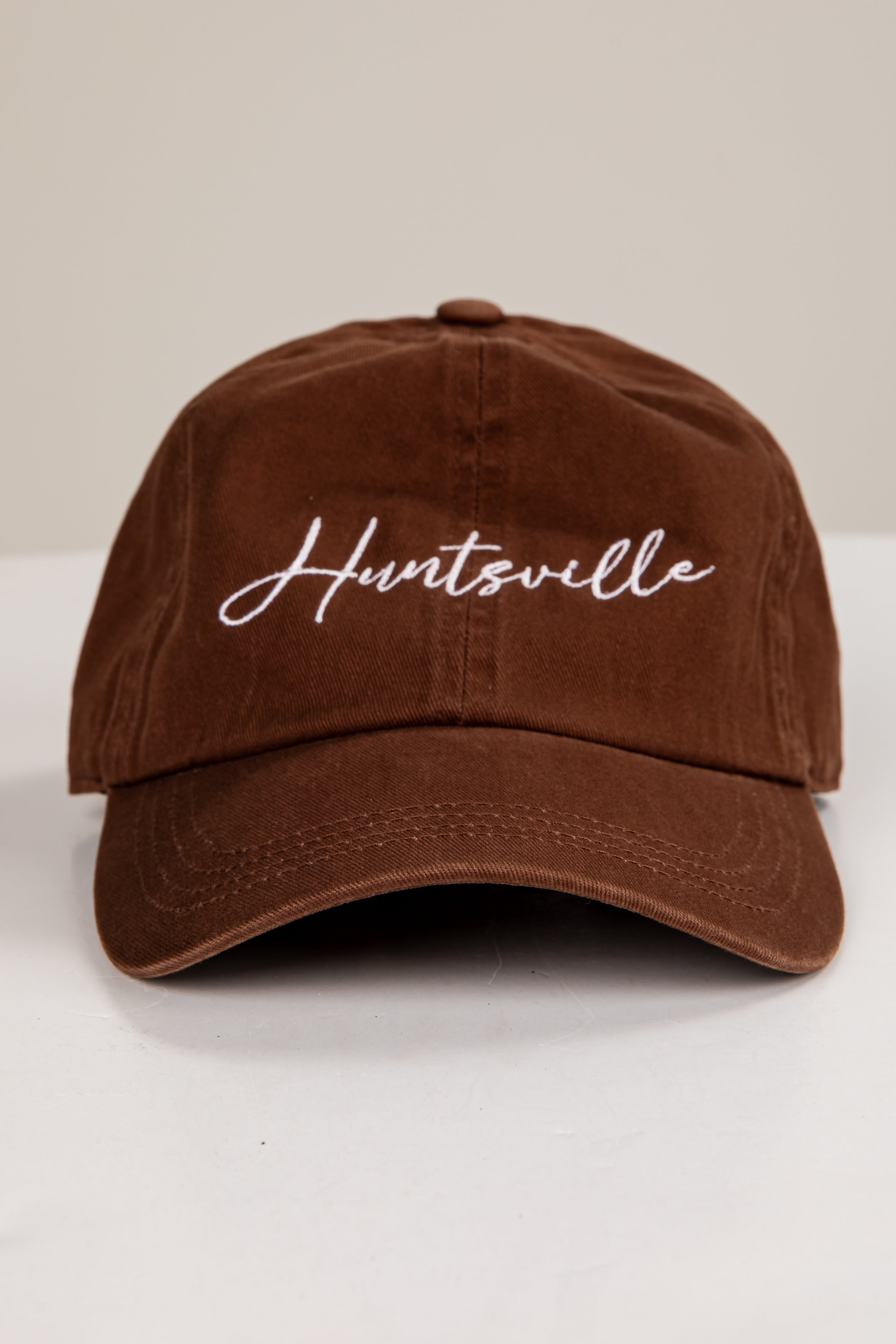 Brown cap with &