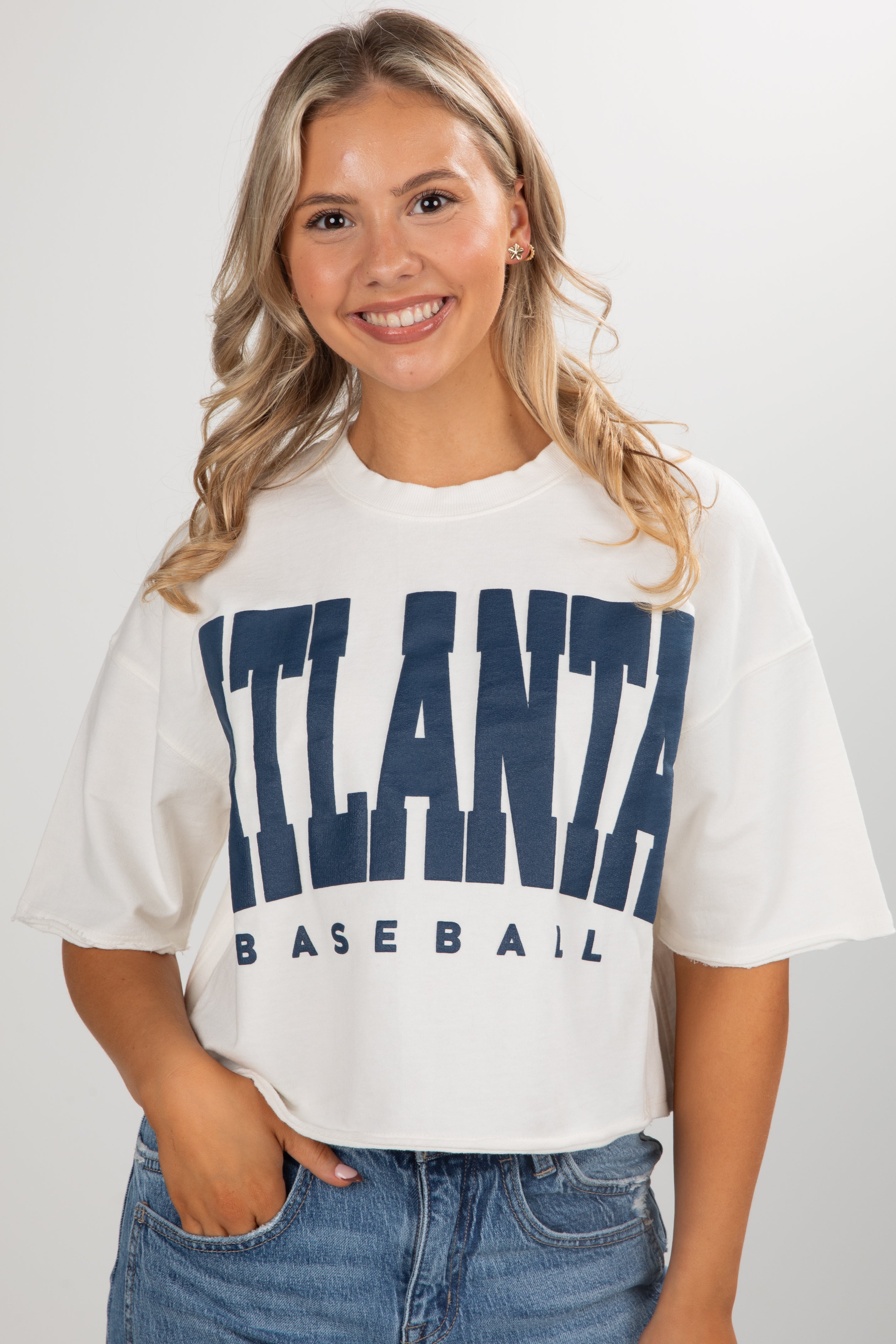 Woman wearing a white t-shirt with &