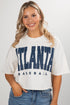Woman wearing a white t-shirt with &