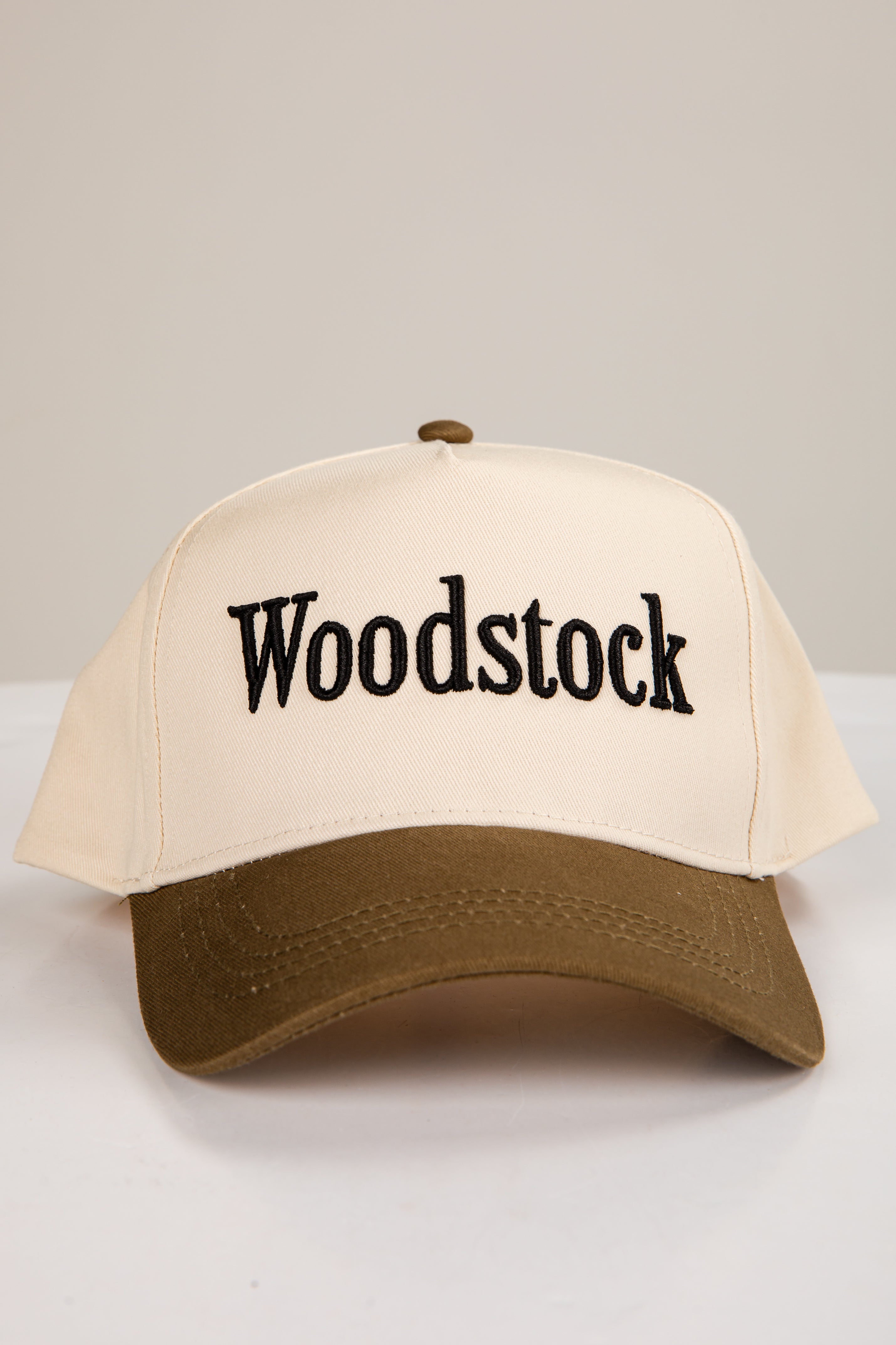 Beige cap with &
