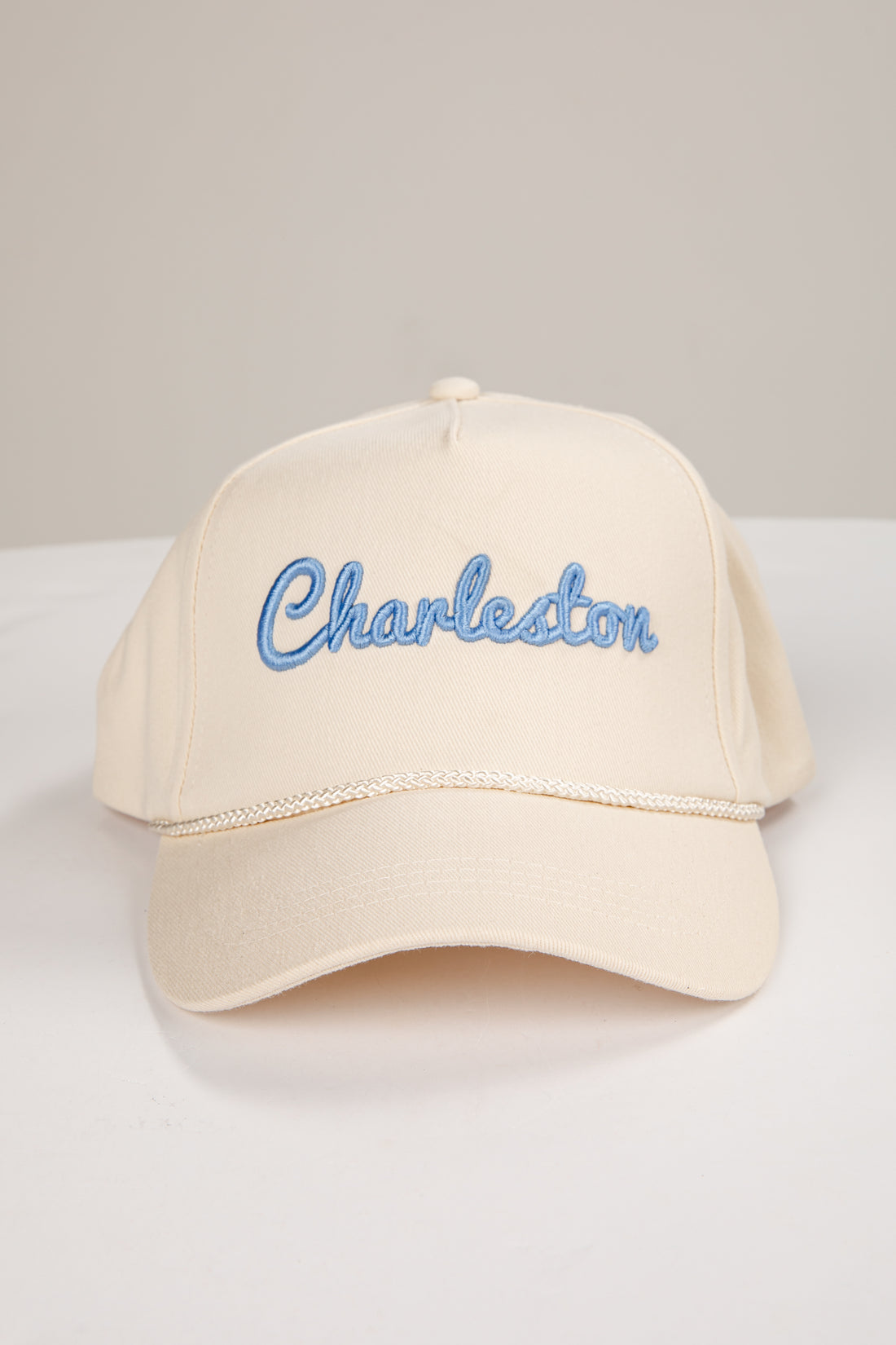 Beige cap with &