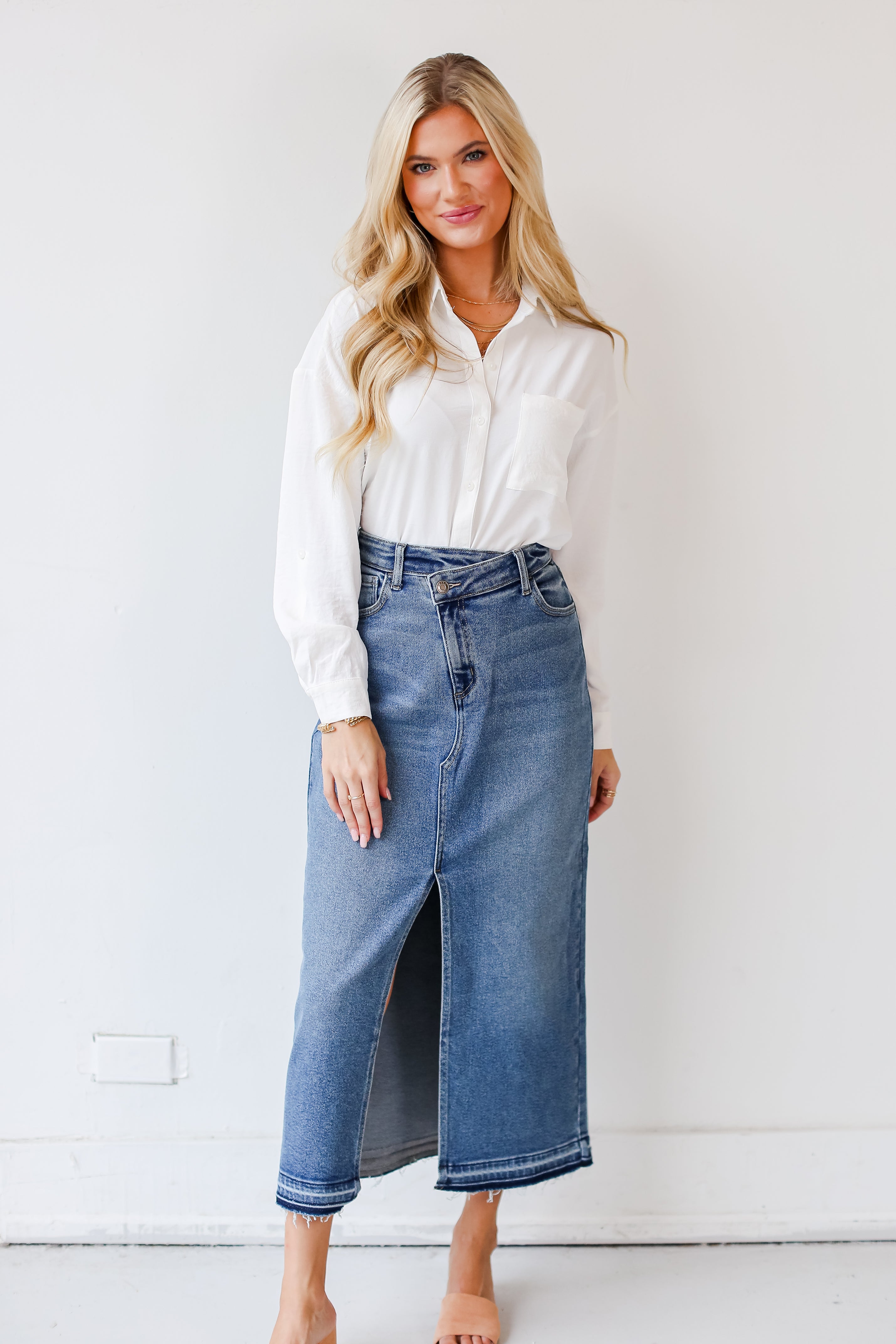 model wearing a medium wash Denim Maxi Skirt