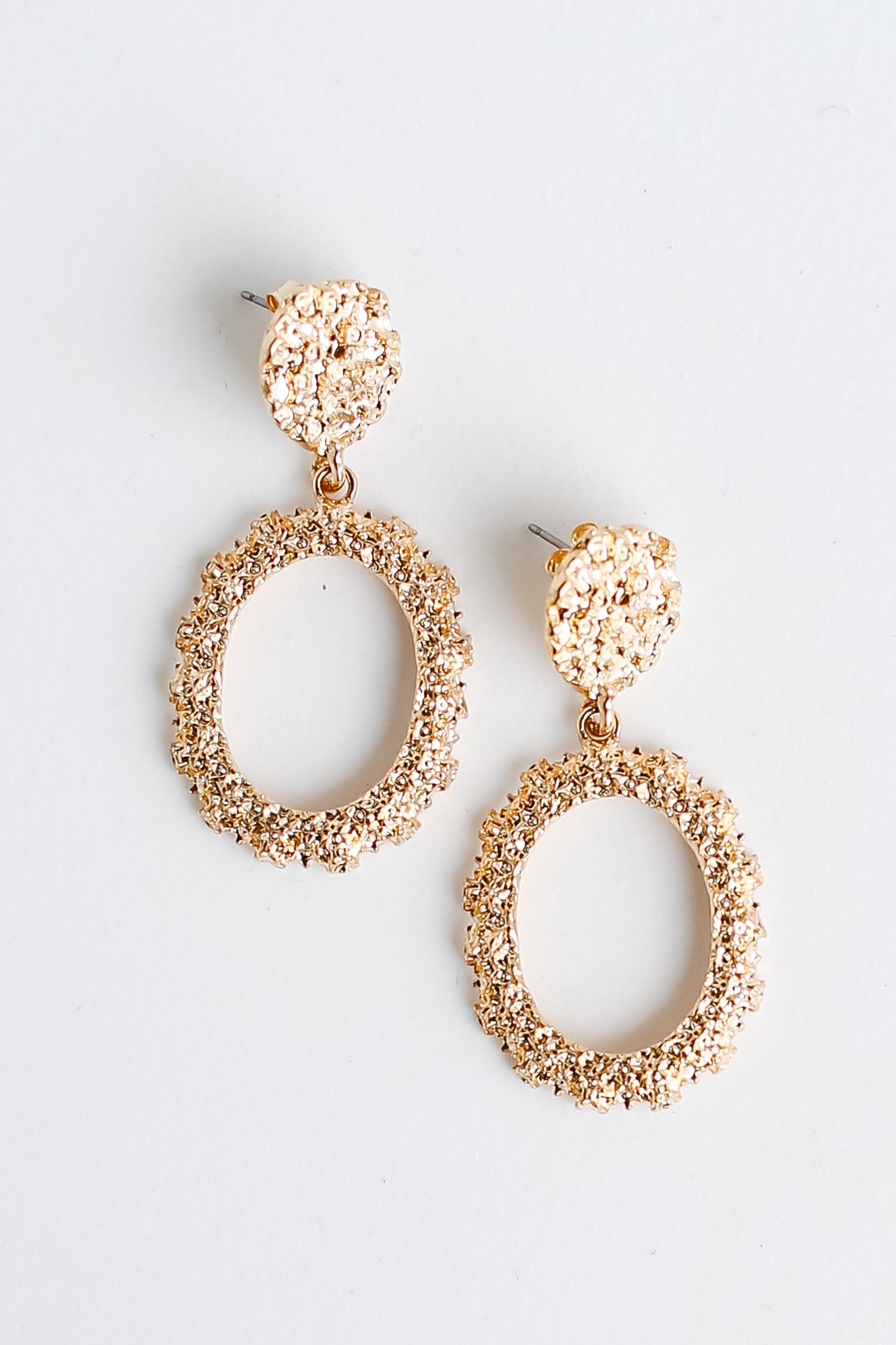 Gold Textured Drop Earrings flat lay