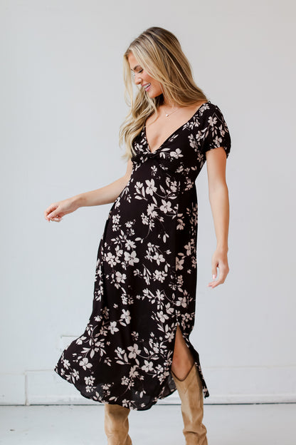 model wearing a Black Floral Midi Dress