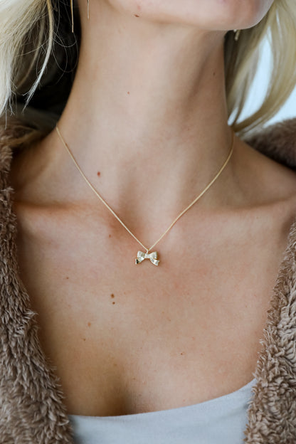 Gemma Gold Bow Charm Necklace