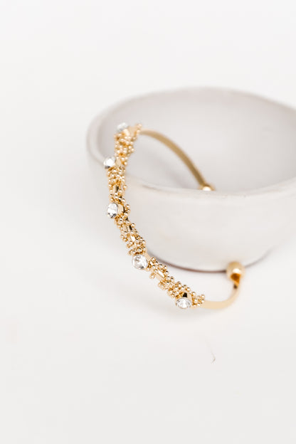 Gold Rhinestone Cuff Bracelet flat lay