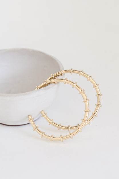 Gold Hoop Earrings flat lay