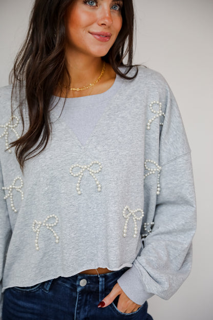 Dazzling Warmth Pearl Bow Cropped Pullover