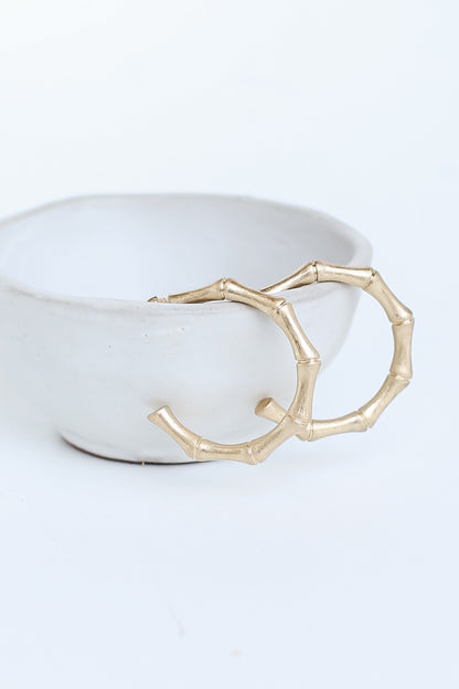 Gold Hoop Earrings flat lay
