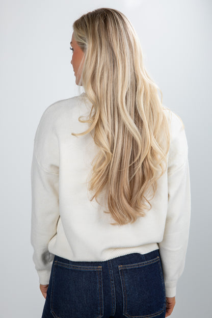 white sweater