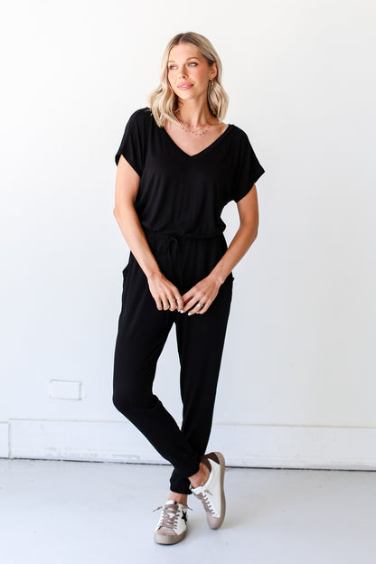 black Jumpsuit with sneakers