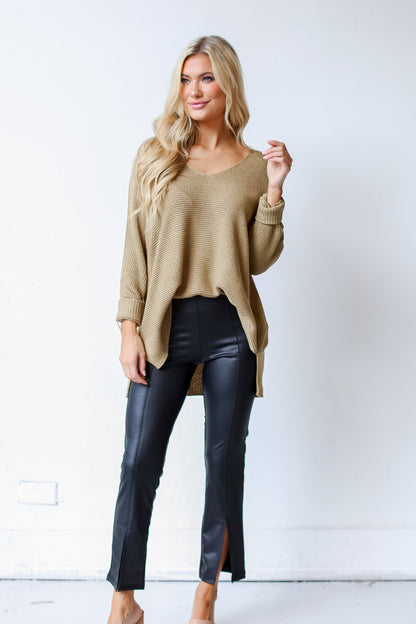 black Leather Split Hem Pants on model with sweater