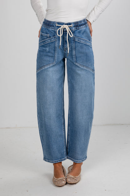 Blue jeans with a white background