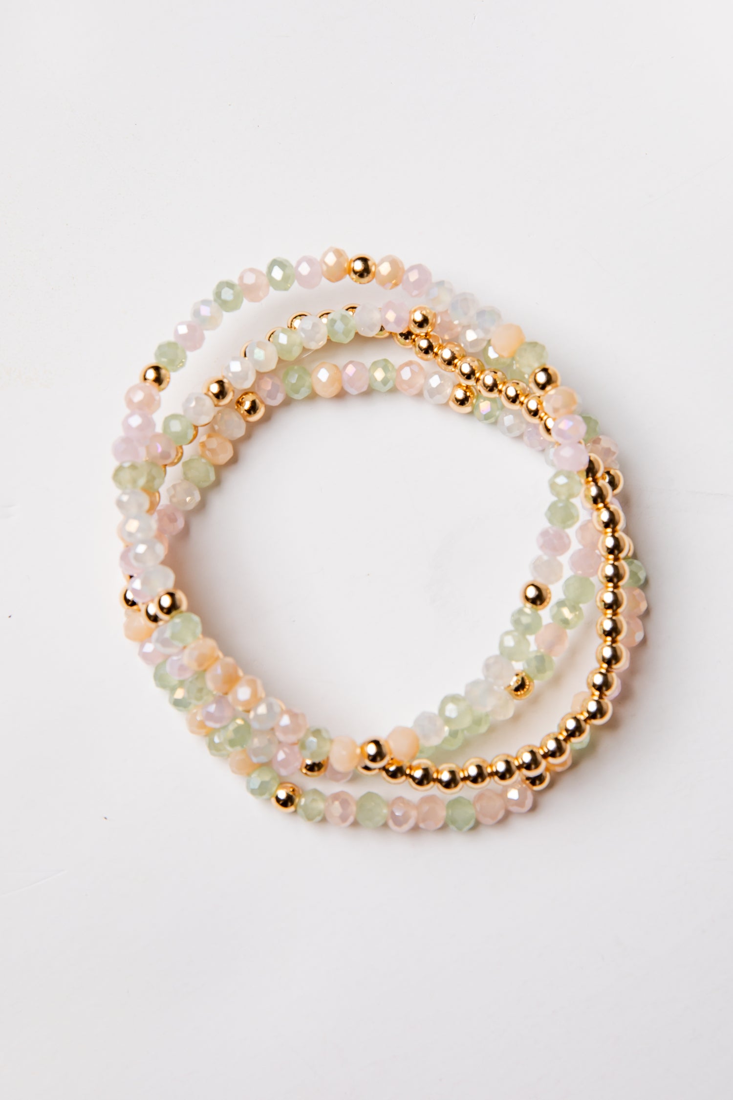 set of 4 gold and colorful beaded bracelets