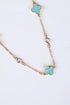 Necklace with turquoise flower pendants on a white background
