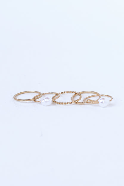 Gold Pearl Ring Set flat lay